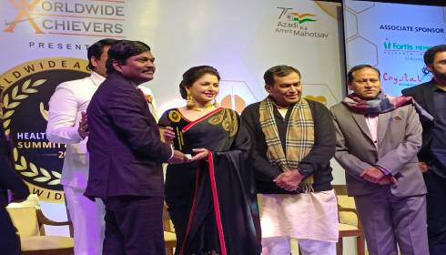 Bollywood actress Bhagyashree giving away awards to doctors 