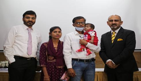Team of Indrapratha Apollo Hospitals doctors with baby and her parents